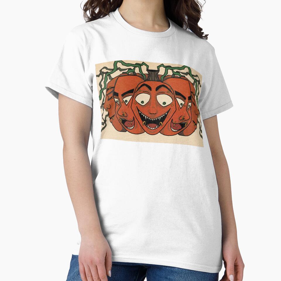 Pumpkin with faces and piercings by Esjumee